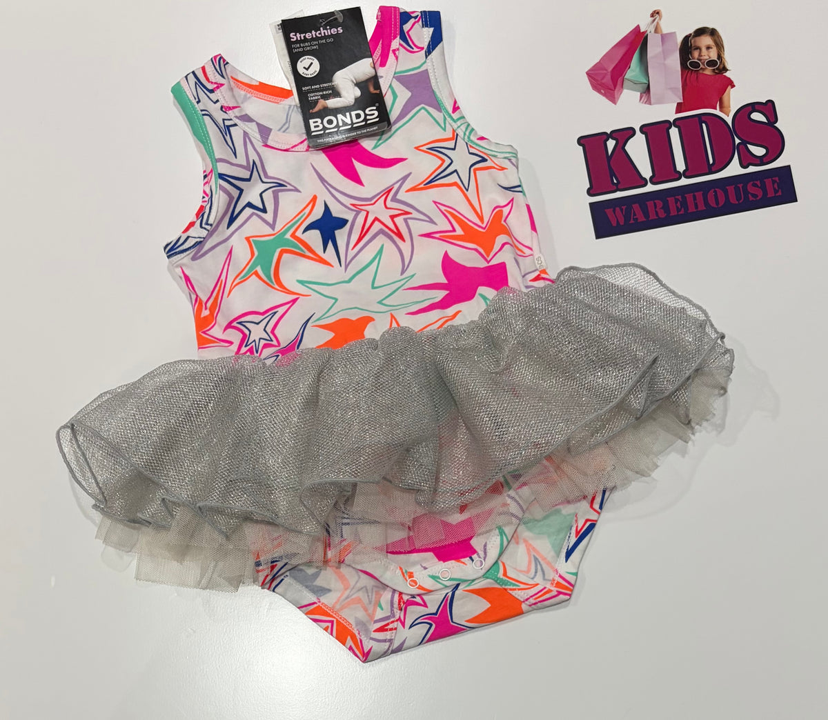 Not Used Bonds White, Pink, Orange Star Print Skirted Bodysuit Size 1