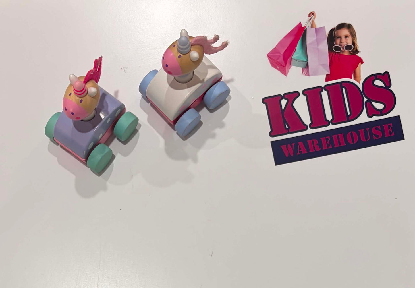 2 Wooden Squeaking Unicorn Car Toys