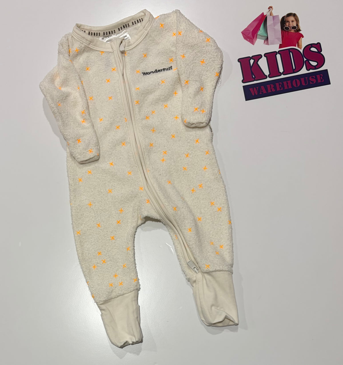 Bonds Fluffy White, Orange X Print Wondersuit Size 000