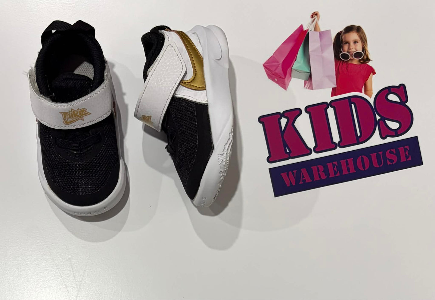 Nike Black, White, Gold Runners Size US5/UK4.5 (Child)