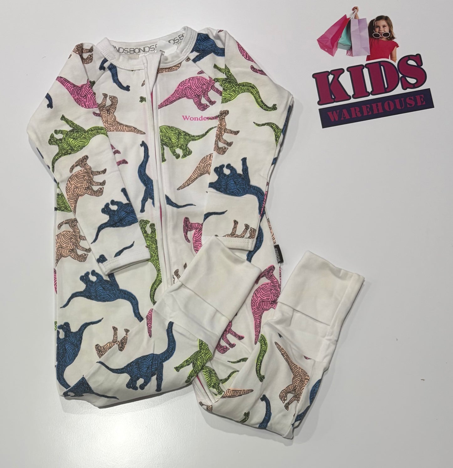 Bonds Wondersuit White, Coloured Dinosaur Print Jumpsuit Size 1